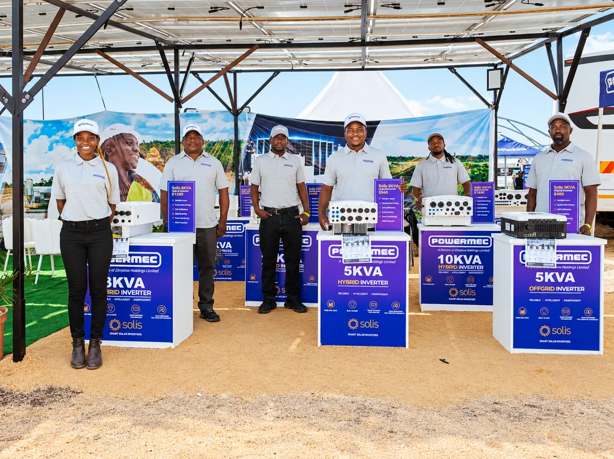 Powermec team at the solar power stand at an expo